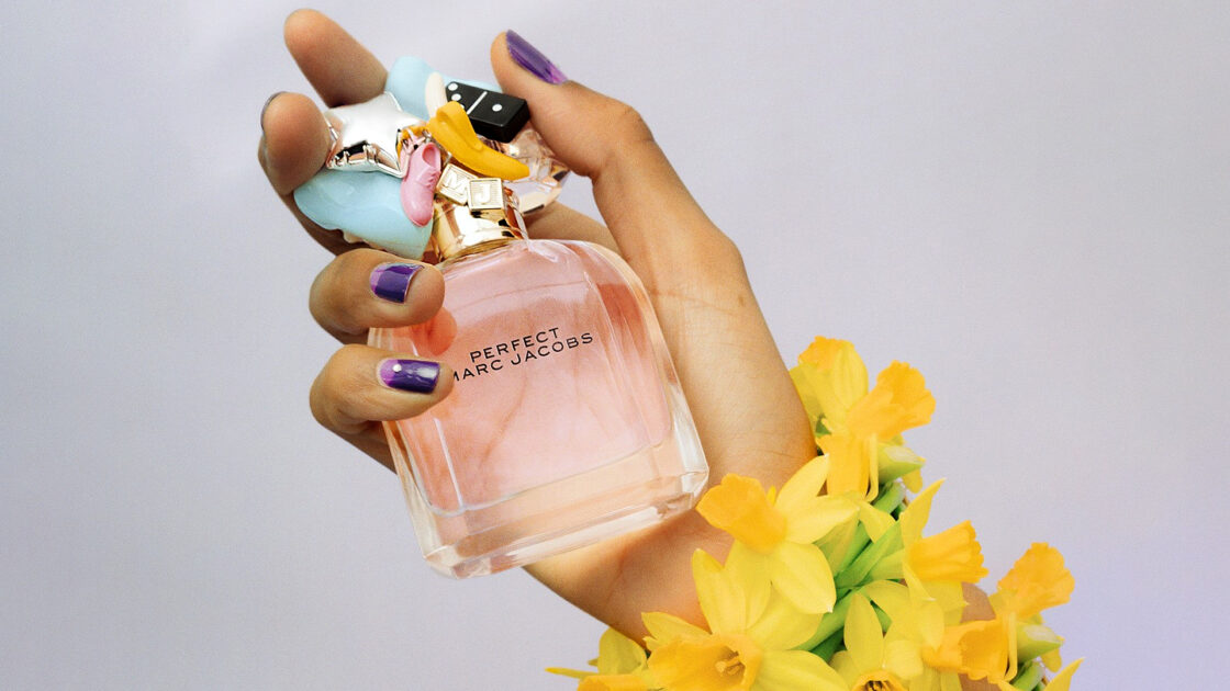 Marc Jacobs Perfect Women Holding Bottle