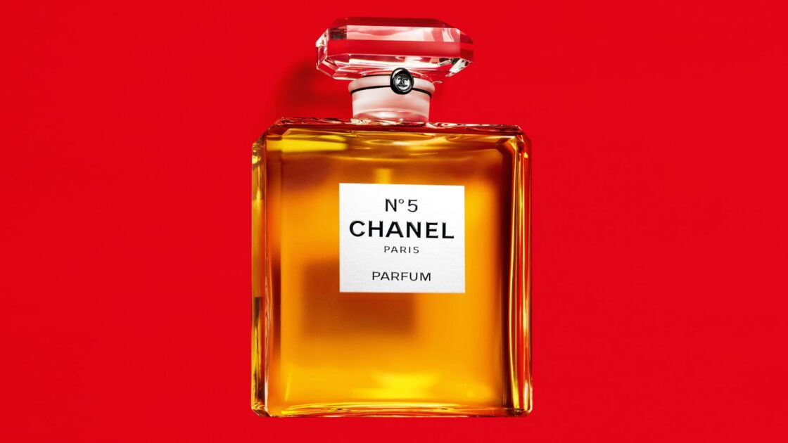 Chanel No 5 bottle on a red background